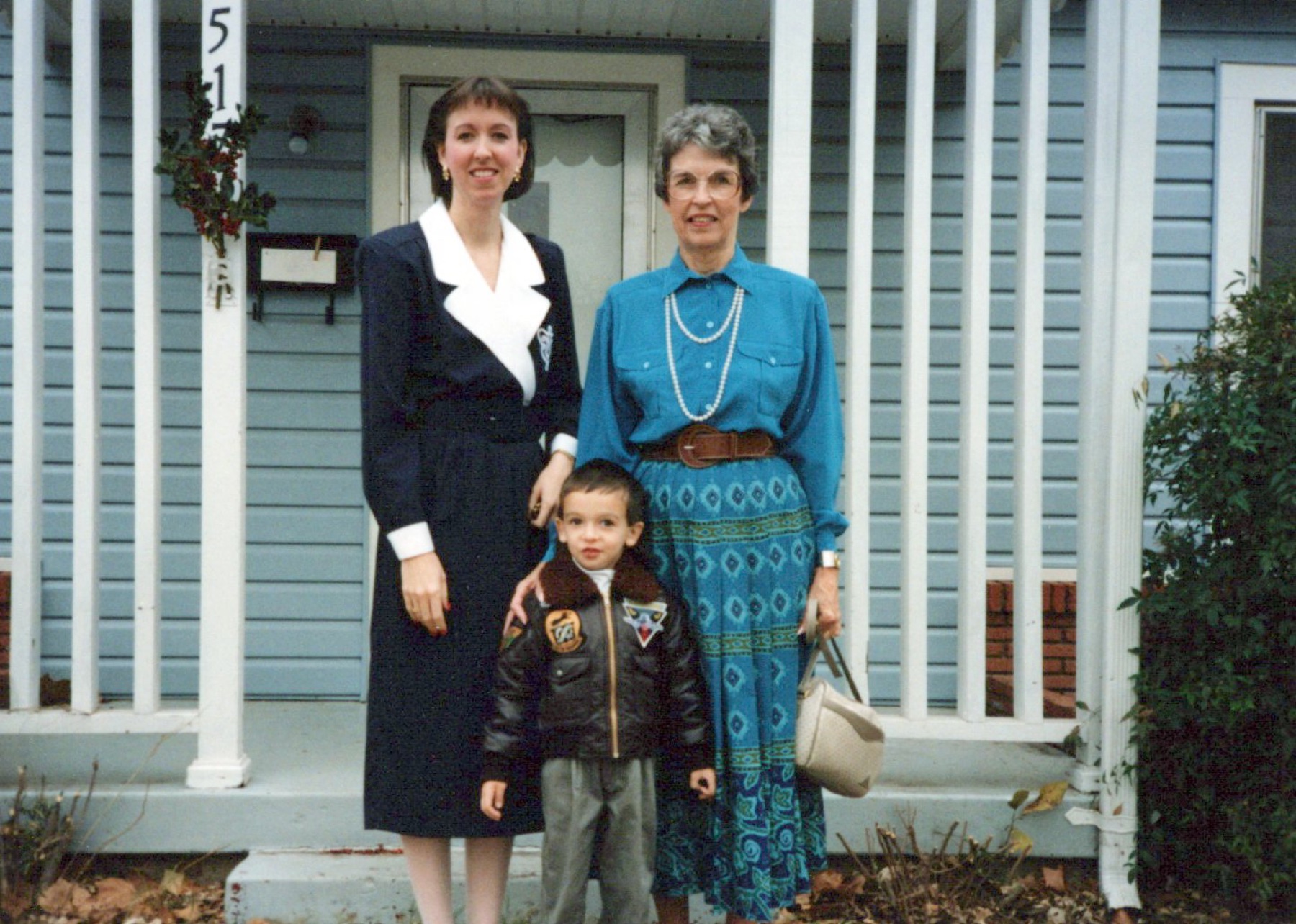 Betsy, Jordan, and Marye on the porch, December 1990.